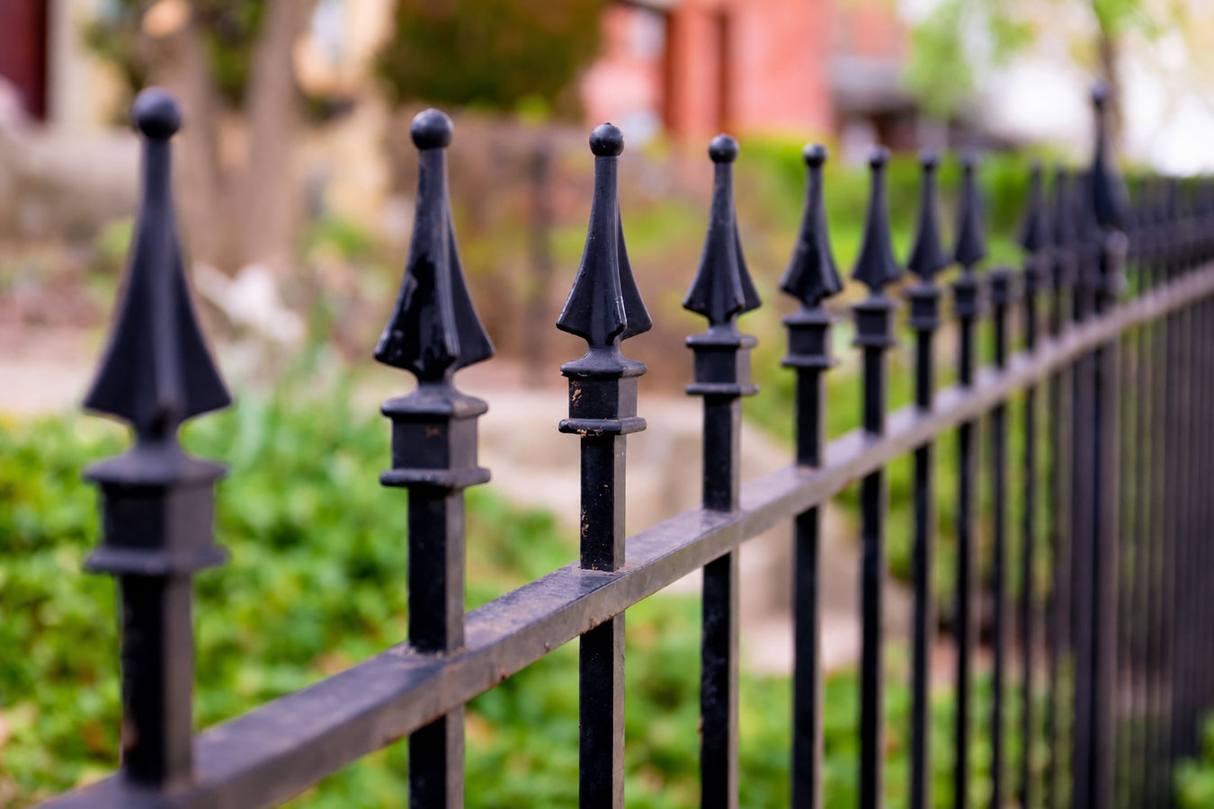 Ornamental iron fence installation